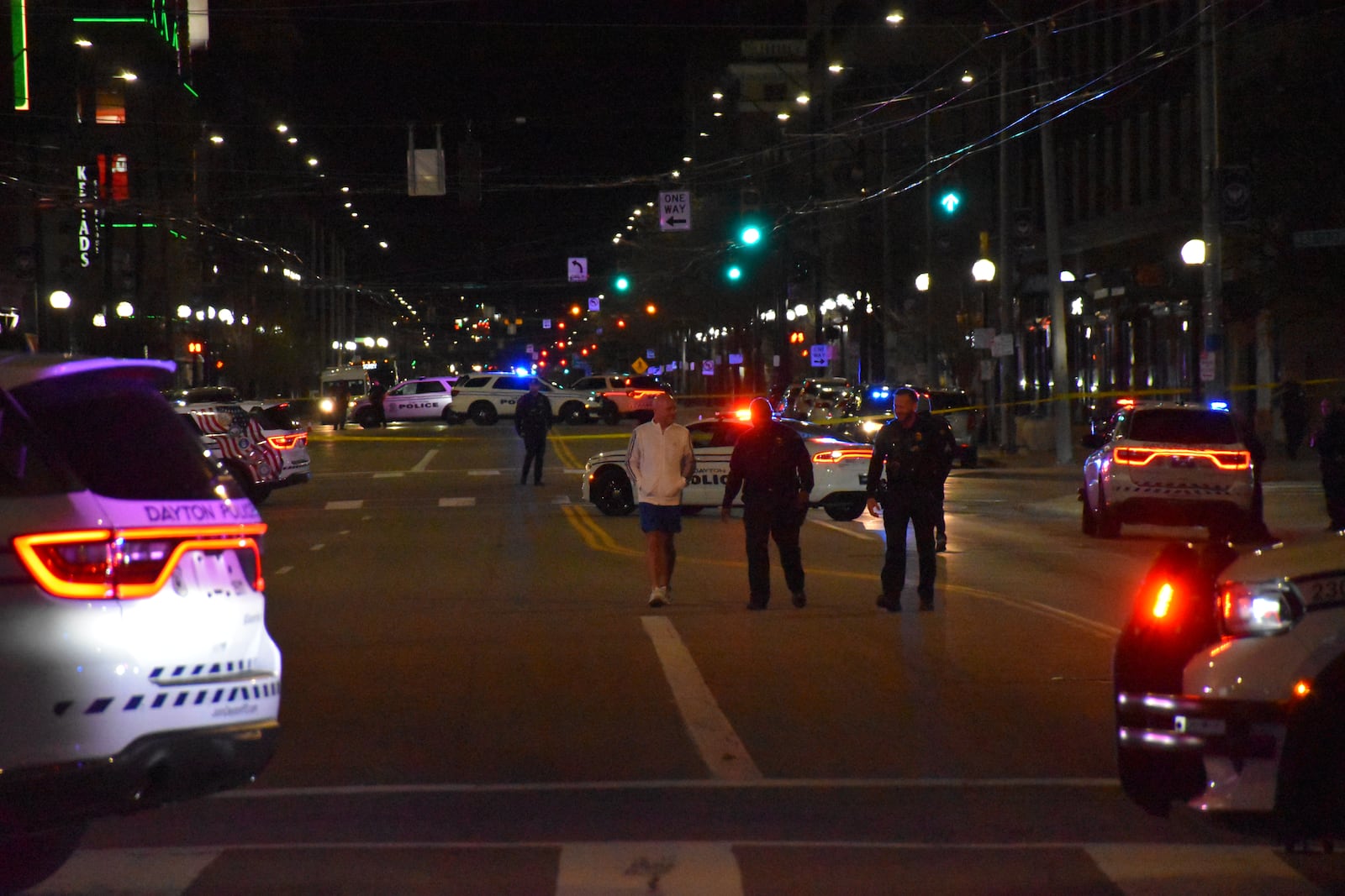 Dayton police blocked off East Third Street from Jefferson Street to Patterson Boulevard after a fatal officer-involved shooting in downtown on Tuesday night. CORNELIUS FROLIK / STAFF