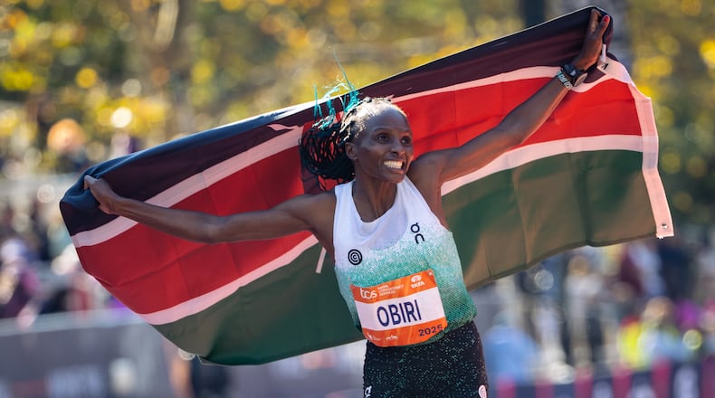 Hellen Obiri celebrates winning first place in the women's elite division of the New York City Marathon, Sunday, Nov. 2, 2025, in New York. (AP Photo/Angelina Katsanis)