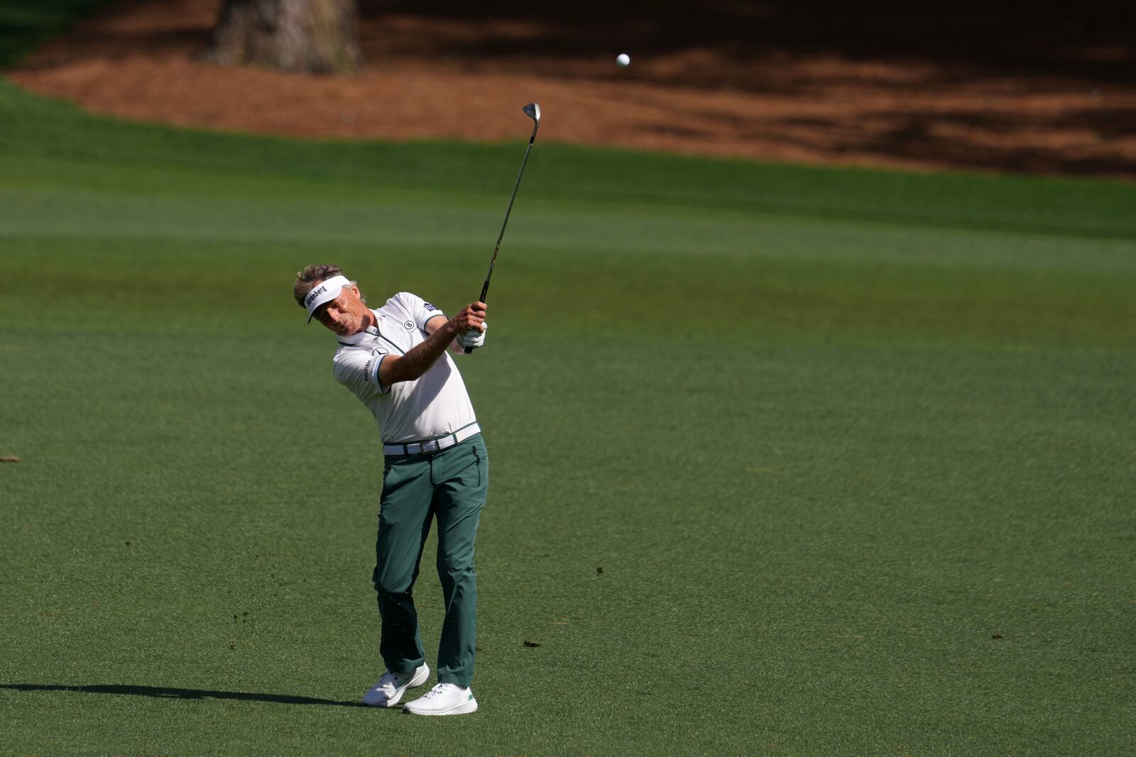 Bernhard Langer, of Germany, hits from the fairway on the 15th hole during the second round at the Masters golf tournament, Friday, April 11, 2025, in Augusta, Ga. (AP Photo/Matt Slocum)