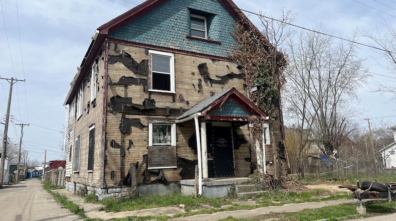 A vacant and deteriorating home in East Dayton. CORNELIUS FROLIK / STAFF