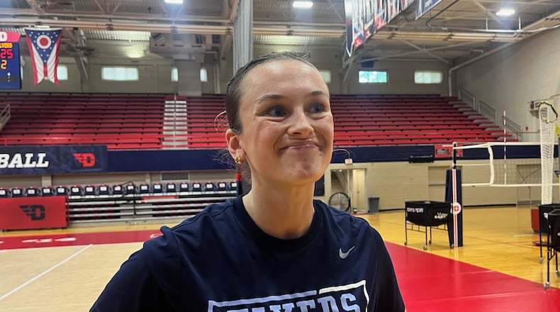 Dayton volleyball player Lexie Almodovar talks to reporters during practice on Wednesday, Aug. 28, 2024, at the Frericks Center. David Jablonski/Staff