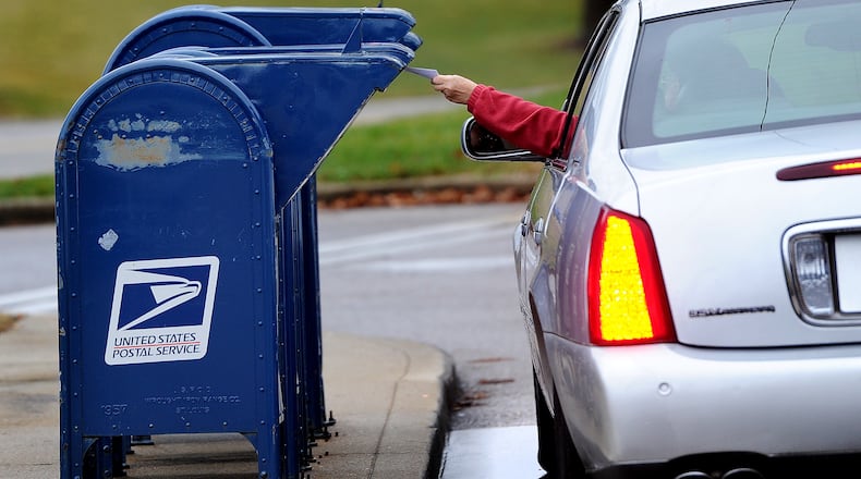 The Beavercreek Police Department is warning residents against using blue mailboxes when mailing items such as cash or checks after receiving reports of thefts from the collections boxes outside U.S. Post Offices. MARSHALL GORBY\STAFF