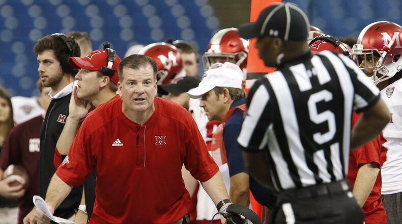 ST. PETERSBURG, FL - DECEMBER 26: Head coach Chuck Martin of the Miami (Oh) Redhawks looks to an official for an explanation on a call during the fourth quarter against the Mississippi State Bulldogs in the St. Petersburg Bowl at Tropicana Field on December 26, 2016, in St. Petersburg, Florida. (Photo by Joseph Garnett, Jr. /Getty Images)