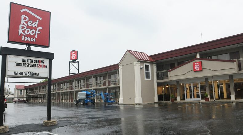 Shaquille Shackleford was indicted Friday for attempted murder after a 25-year-old Dayton woman was shot multiple times May 8 during a carjacking that ended at the Red Roof Inn on Dryden Road in Moraine.