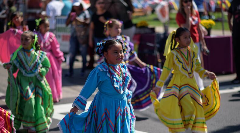The Hispanic Heritage Festival celebrated its 20th year with dancing, food and fun on Saturday, Sept. 18 at RiverScape MetroPark in Dayton. TOM GILLIAM / CONTRIBUTING PHOTOGRAPHER