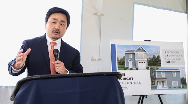 Paul Bradley, the executive director of Montgomery County Lank Bank, speaks during an event on Thursday on Glenelle Drive in Dayton. The Land Bank was awarded $6.96 million from Ohio Department of Development to expand home ownership opportunities to income-eligible residents. BRYANT BILLING / STAFF