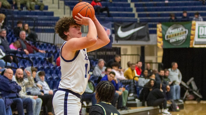 Fairmont's Evan Gentile shoots against Sycamore during the first half of Monday night's Flyin' To The Hoop finale at Trent Arena. Jeff Gilbert/CONTRIBUTED