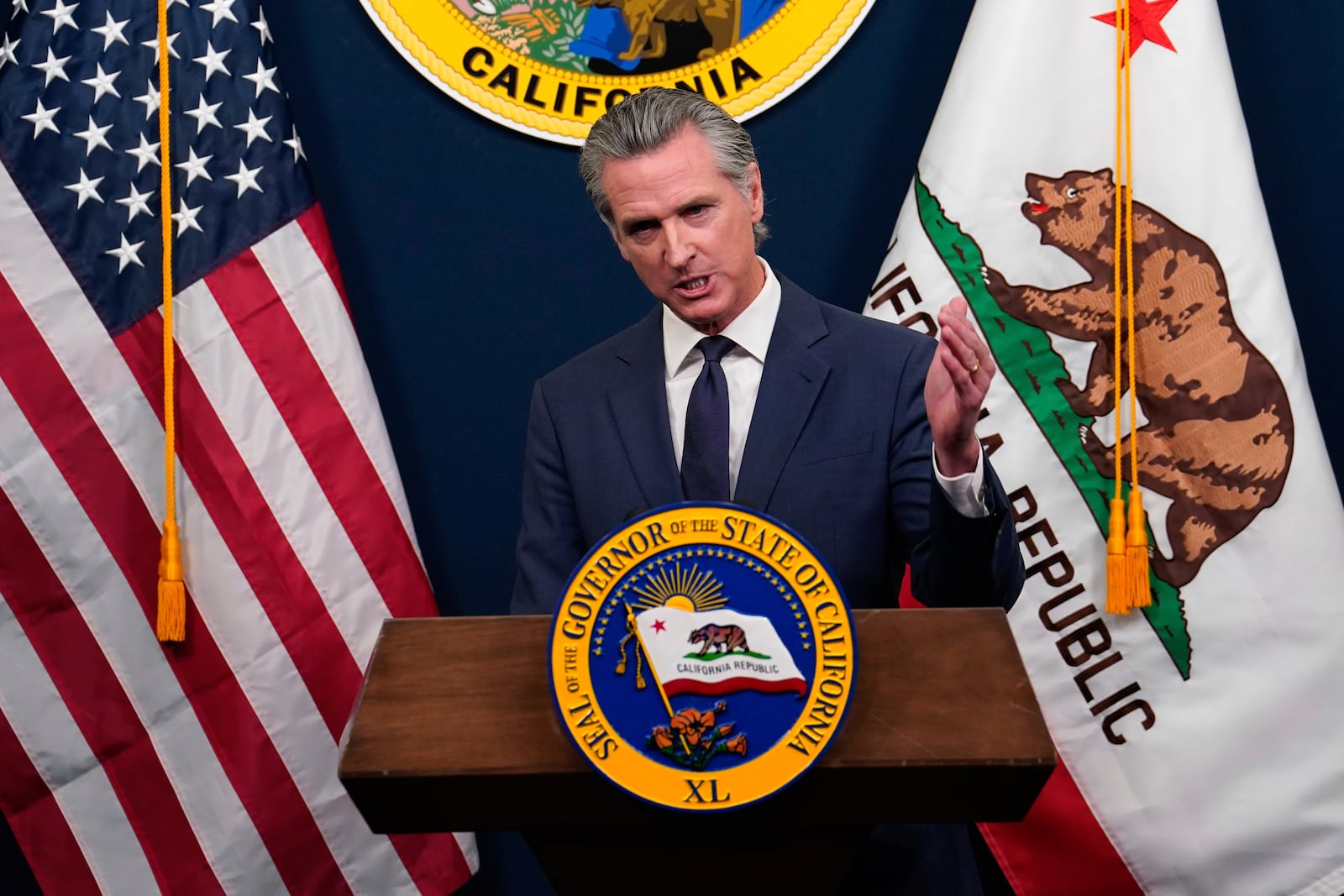 Calif. Gov. Gavin Newsom presents his revised 2025-2026 state budget during a news conference in Sacramento, Calif., Wednesday, May 14, 2025. (AP Photo/Rich Pedroncelli)
