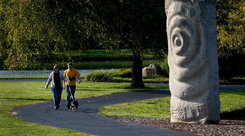 "Rock Waves" created from Indiana limestone by the artist Anno Sieberts, can be found in Kettering's Delco Park. LISA POWELL / STAFF