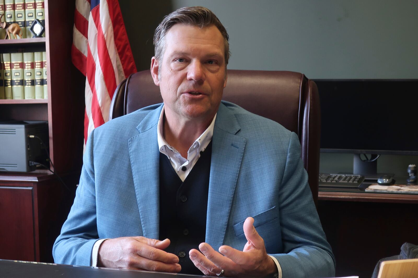 FILE - Kansas Attorney General Kris Kobach speaks during an interview with The Associated Press, Dec. 18, 2024, in his office in Topeka, Kan. (AP Photo/John Hanna, File)
