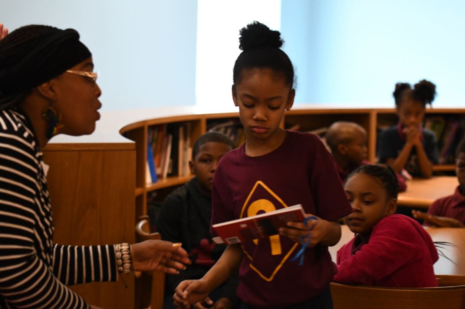 Photos: Dayton Strong! Kids receive copies of book they wrote about tornadoes