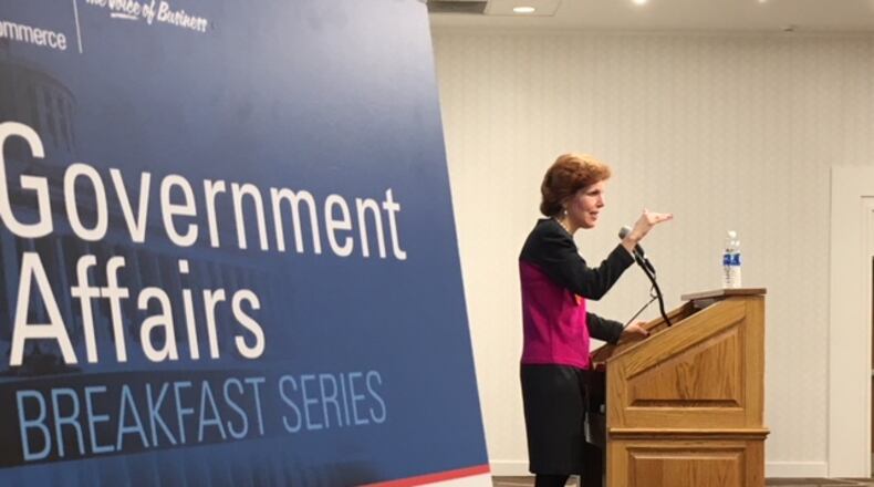 Loretta Mester, president and chief executive of the Federal Reserve Bank of Cleveland, speaks Tuesday morning at a Dayton Area Chamber of Commerce government affairs breakfast meeting. THOMAS GNAU/STAFF