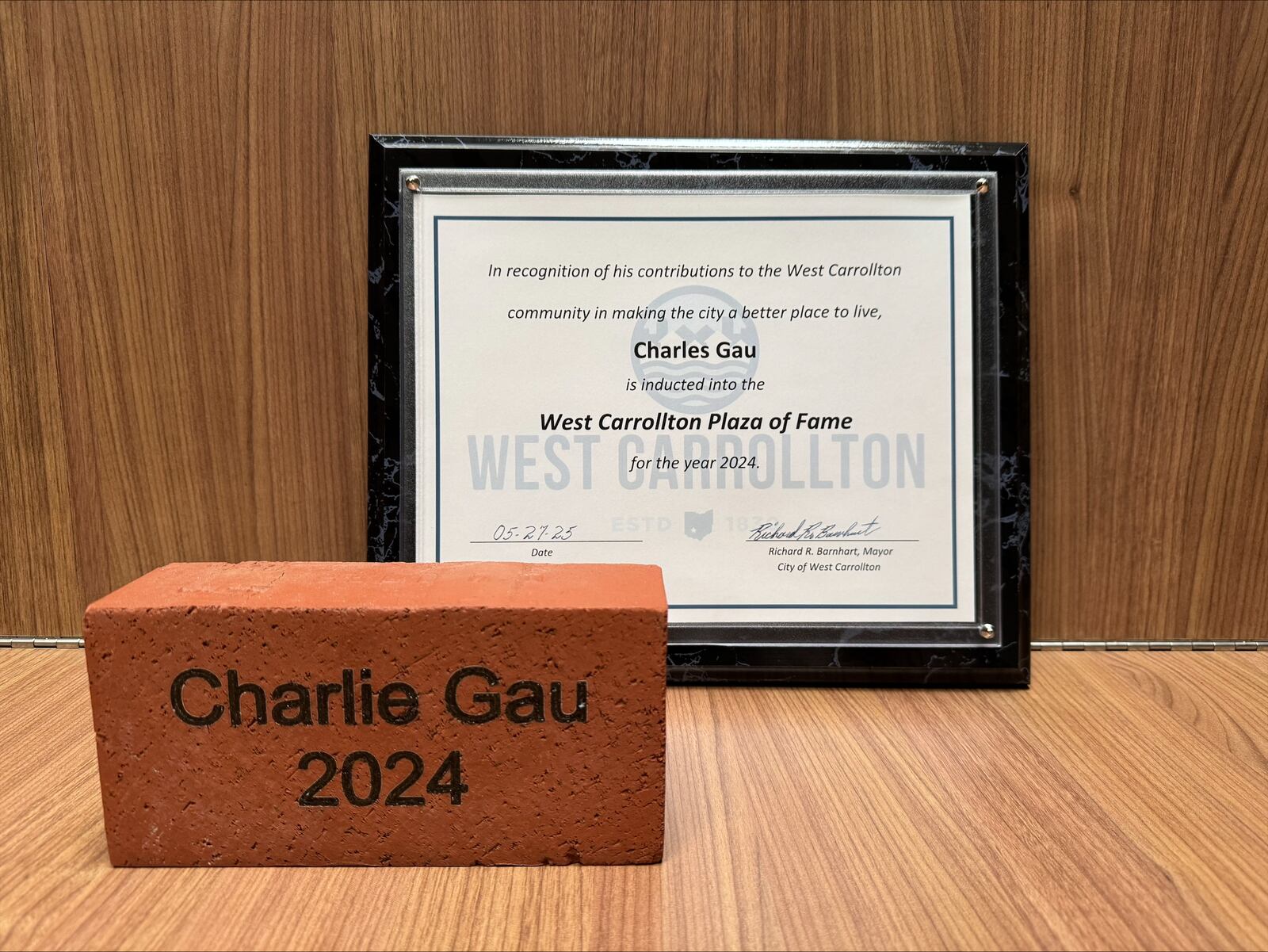 West Carrollton named Charlie Gau, 81, the recipient of its annual Plaza of Fame Award Tuesday, May 27, 2025. Gau was nominated for the honor for his dedication to feeding families, supporting the local food pantry and helping those in need. CONTRIBUTED