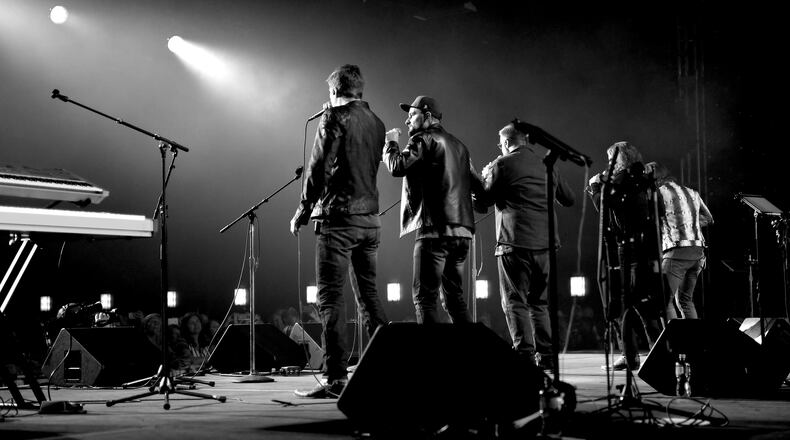 LAS VEGAS, NEVADA - APRIL 06: (EDITORS NOTE: Image has been converted to black and white.) Home Free performs onstage at ACM Lifting Lives®: Decades on April 06, 2019 in Las Vegas, Nevada. (Photo by Jason Kempin/Getty Images for ACM)