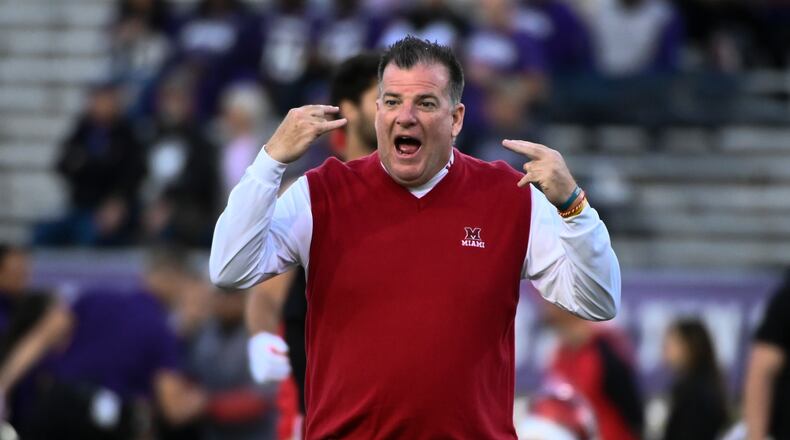 Miami (Ohio) coach Chuck Martin watches players before an NCAA college football game against Northwestern, Saturday, Sept. 24, 2022, in Evanston, Ill. (AP Photo/Matt Marton)
