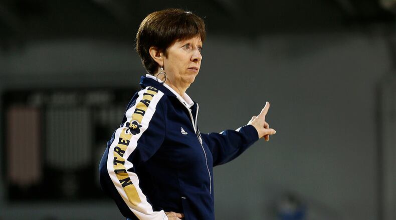 CHARLESTON, SC - NOVEMBER 09: Head coach Muffet McGraw of the Notre Dame Fighting Irish coaches against the Ohio State Buckeyes during the Walmart Carrier Classic on the deck of the USS Yorktown on November 9, 2012 in Charleston, South Carolina. (Photo by Rob Carr/Getty Images)