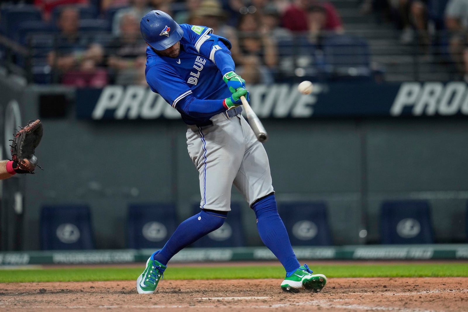 Toronto Blue Jays' George Springer hits a home run in the eighth inning of a baseball game against the Cleveland Guardians in Cleveland, Tuesday, June 24, 2025. (AP Photo/Sue Ogrocki)