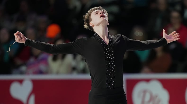 Maxim Naumov skates during the "Making Team USA" performance at the U.S. Figure Skating Championships, Sunday, Jan. 11, 2026, in St. Louis. (AP Photo/Stephanie Scarbrough)