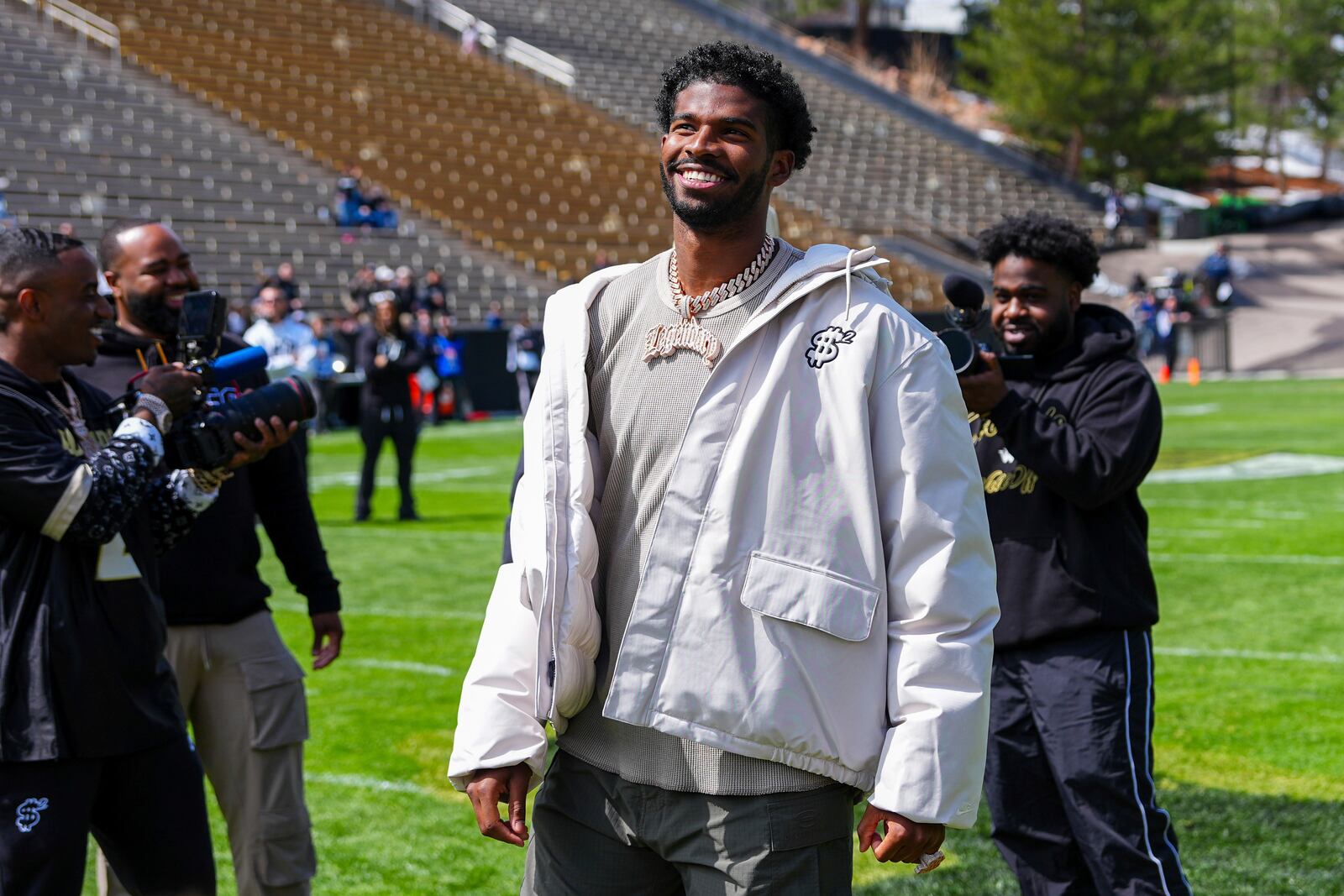 Shedeur Sanders looks on at his jersey retirement ceremony during Colorado's NCAA college football spring game, Saturday, April 19, 2025, in Boulder, Colo. (AP Photo/Jack Dempsey)