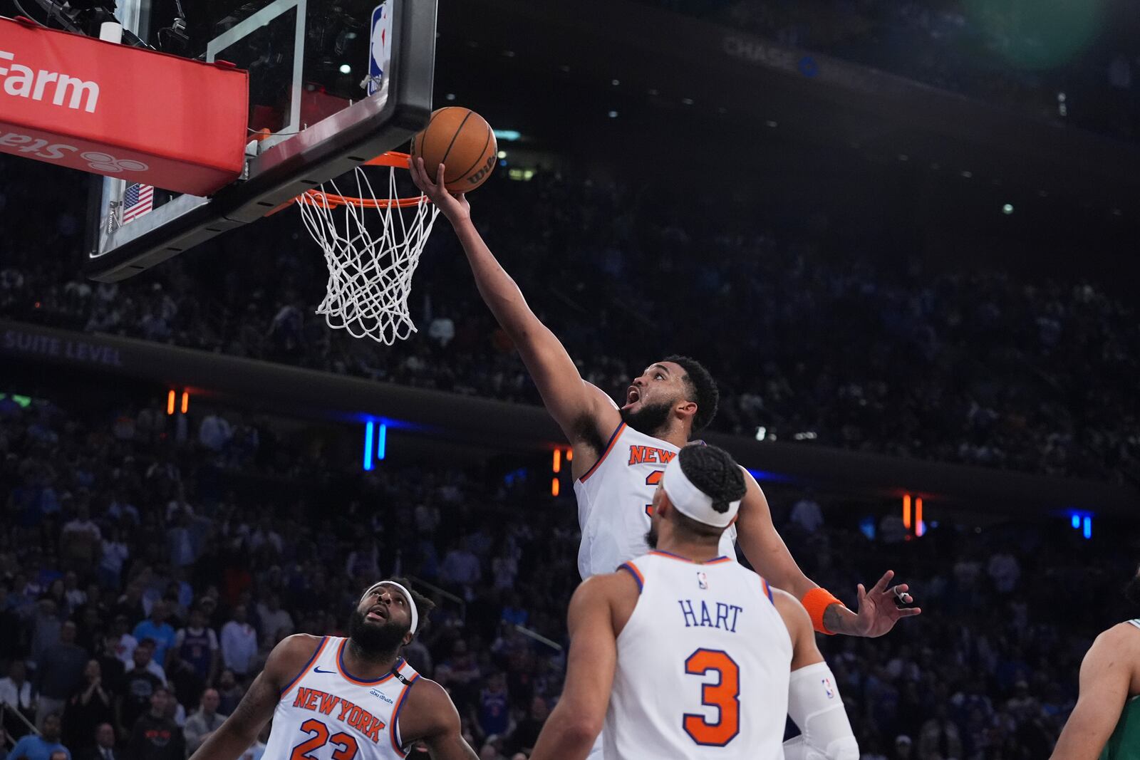 New York Knicks' Karl-Anthony Towns (32) drives to the basket during the first half of Game 6 in the Eastern Conference semifinals of the NBA basketball playoffs against the Boston Celtics Friday, May 16, 2025, in New York. (AP Photo/Frank Franklin II)