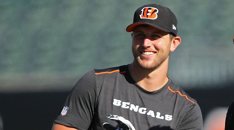 CINCINNATI, OH - OCTOBER 23: Tyler Eifert #85 and Andy Dalton #14 of the Cincinnati Bengals talk while warming up prior to the start of the game against the Cleveland Browns at Paul Brown Stadium on October 23, 2016 in Cincinnati, Ohio. (Photo by John Grieshop/Getty Images)
