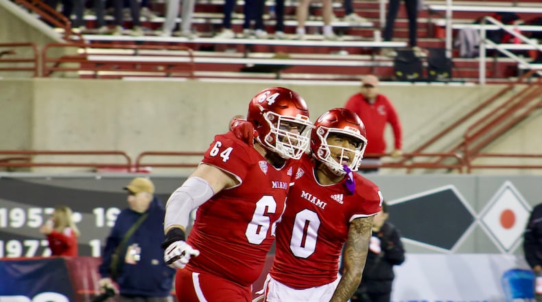 Reggie Virgil celebrates his eight receiving touchdown of the year against Northern Illinois on Nov. 19. Kasey Turman/CONTRIBUTED