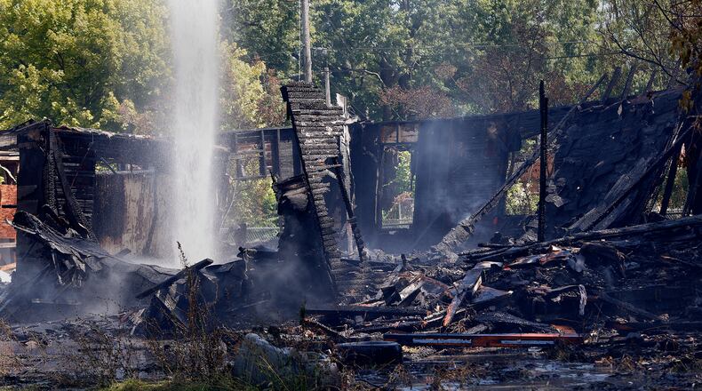 Trotwood and Dayton Fire Departments responded to a fully involved vacant house fire at 5813 Lorimer Street, Monday, Aug. 12, 2024. No injuries were reported. MARSHALL GORBY\STAFF