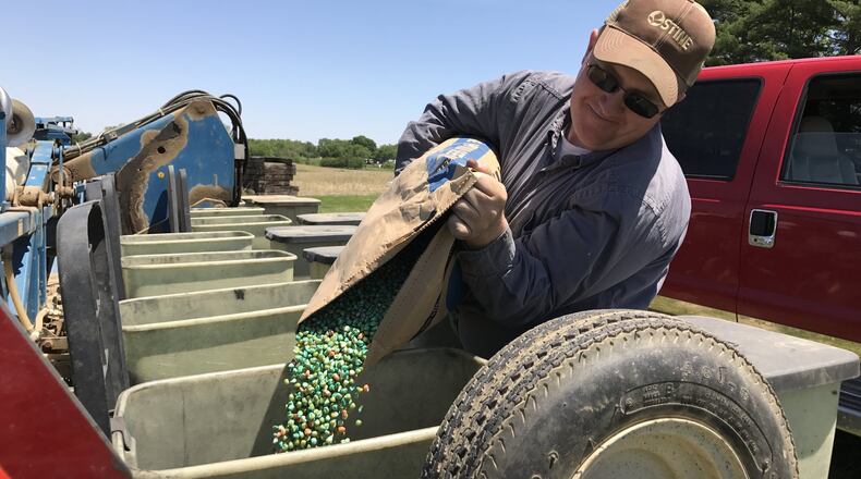 Lifelong farmer Lane Osswald on his farm north of Easton in West Manchester, Ohio. Osswald, who sits on the Ohio Farm Bureau, believes the NAFTA negotiations could improve the plight of farmers in Ohio. GRANT PEPPER/STAFF