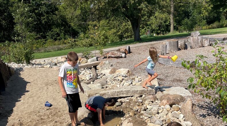 Possum Creek MetroPark nature play area recently underwent an expansion, adding a dry creek bed with water source. PHOTO BY SOPHIA DAUGHERTY