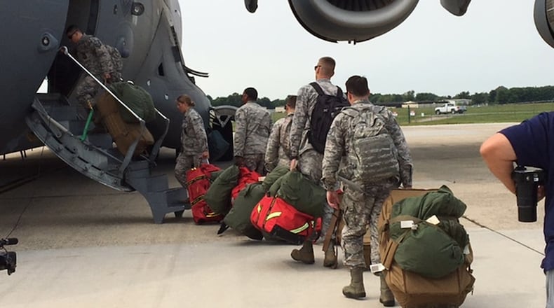 Air Force Reserve firefighters board a Wright-Patterson based C-17 at Joint Base McGuire-Dix-Lakehurst, N.J., on Sept. 12, 2017, as they head to south Florida for Hurricane Irma relief efforts. BARRIE BARBER/STAFF