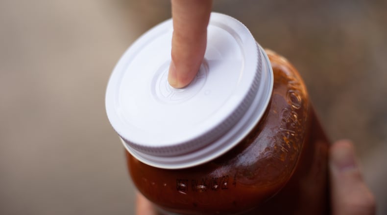 The EEASY Lid, created and manufactured in Dayton, makes opening a vacuum-sealed jar almost twice as easy with just the push of a button. CONTRIBUTED