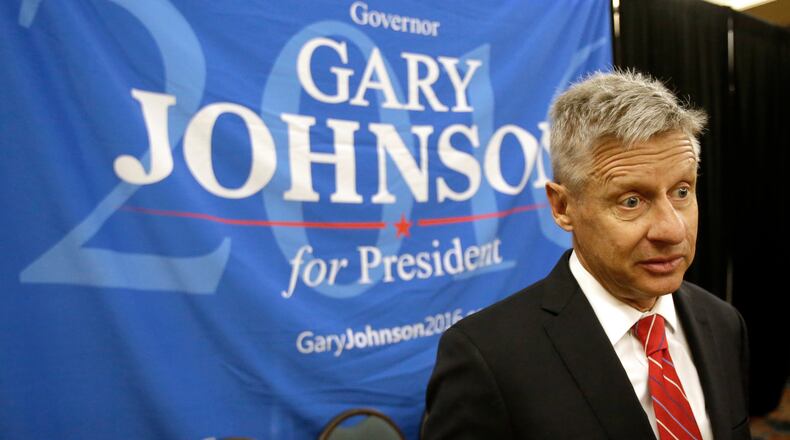 In this May 27, 2016, file photo, Libertarian presidential candidate Gary Johnson speaks to supporters and delegates at the National Libertarian Party Convention in Orlando, Fla. Libertarian Party activists in Ohio, hoping to get party nominee Gary Johnson on Ohio’s ballot, said they submitted petition signatures Tuesday, Aug. 9, 2016, for Charlie Earl, a 2014 candidate for governor, as a placeholder because they began collecting signatures before Johnson’s nomination. (AP Photo/John Raoux, File)