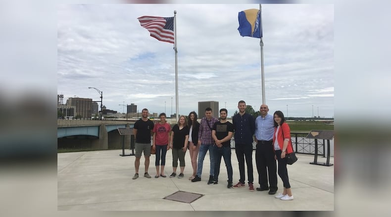 Students from Dayton Regional STEM School (DRSS) and university students Bosnia-Herzegovina visit Dayton’s Holbrooke Plaza with Dayton City Commissioner Matt Joseph as part of the DRSS International Internship Exchange Experience. Pictured, from left: Mateo Cubela, Gloria Campos, Bri Perkins, Edna Voloder, Dario Saravanja, Nikola Dreznak, Rijad Gosto, Matt Joseph and Ana Bogdanovic. CONTRIBUTED