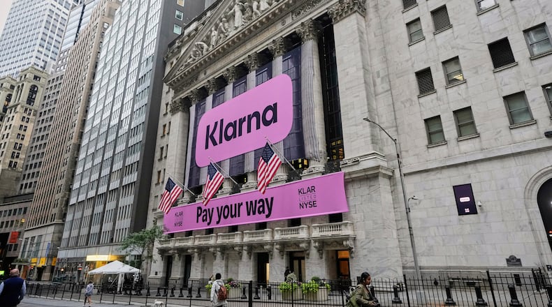 FILE - The facade of New York Stock Exchange displays signage for Sweden's Klarna, Sept. 10, 2025. (AP Photo/Richard Drew, File)