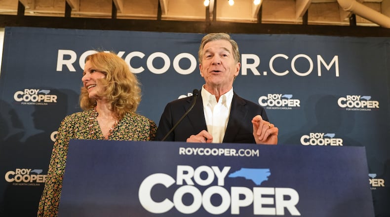 North Carolina Democratic Senate candidate former Gov. Roy Cooper speaks at a primary election night watch party Tuesday, March 3, 2026, in Raleigh, N.C. (AP Photo/Matt Ramey)