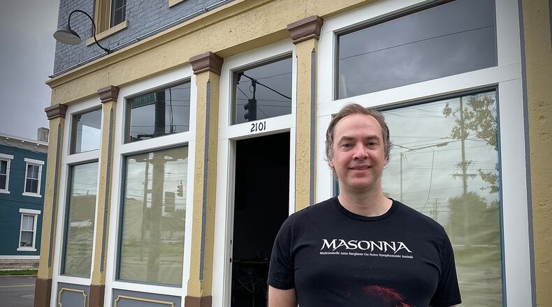Skeleton Dust Records is planning to move from Dayton’s Fire Blocks District to the Huffman Historic Area on East Fifth Street in September. Pictured is owner Luke Tandy. NATALIE JONES/STAFF