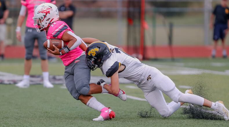 Andre McConnell of Stebbins, shown here vs. Springfield Shawnee last week, scored five TDs on Friday night vs. Sidney. Michael Cooper/CONTRIBUTED