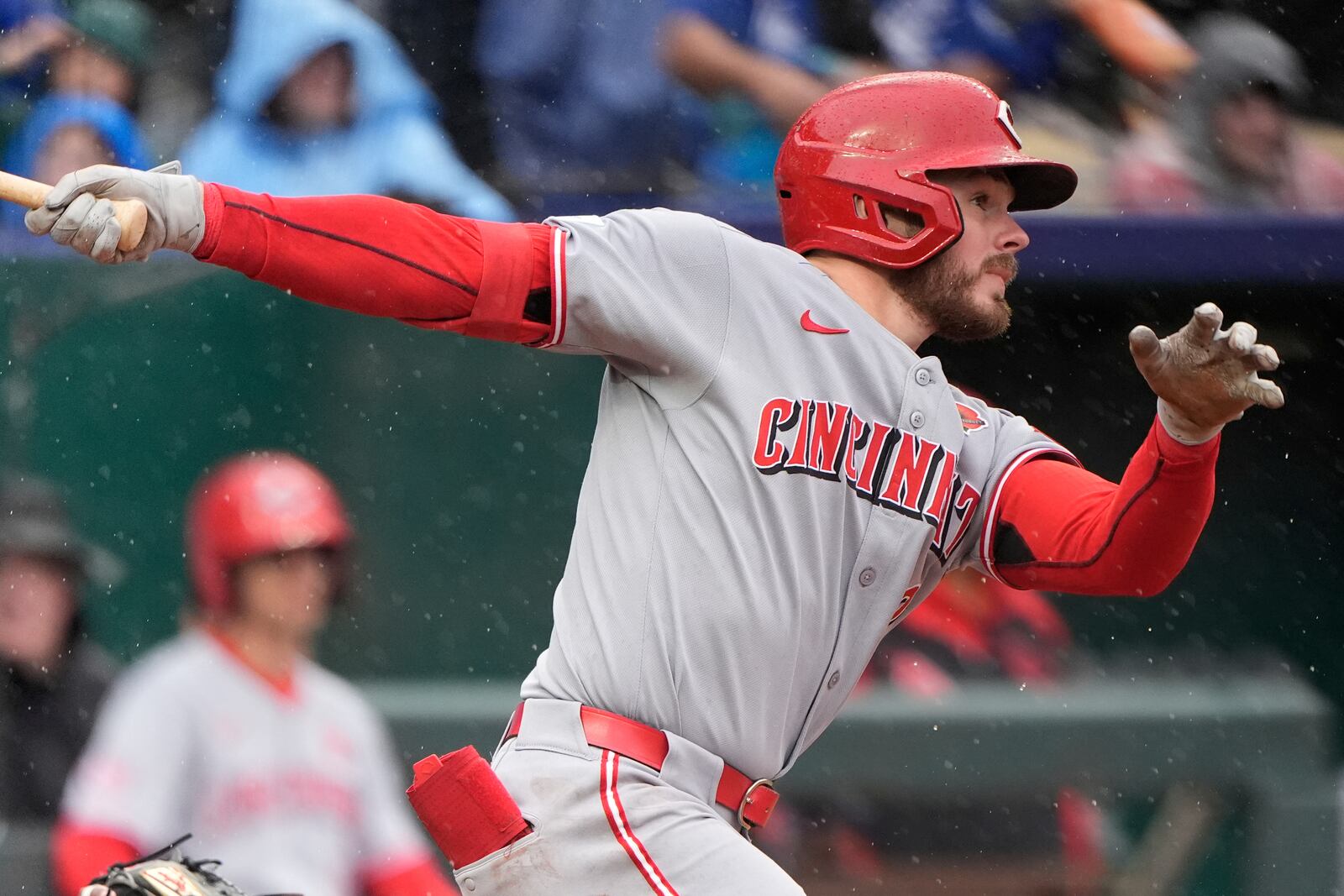 Cincinnati Reds' Gavin Lux watches his RBI single during the third inning of a baseball game against the Kansas City Royals, Monday, May 26, 2025, in Kansas City, Mo. (AP Photo/Charlie Riedel)