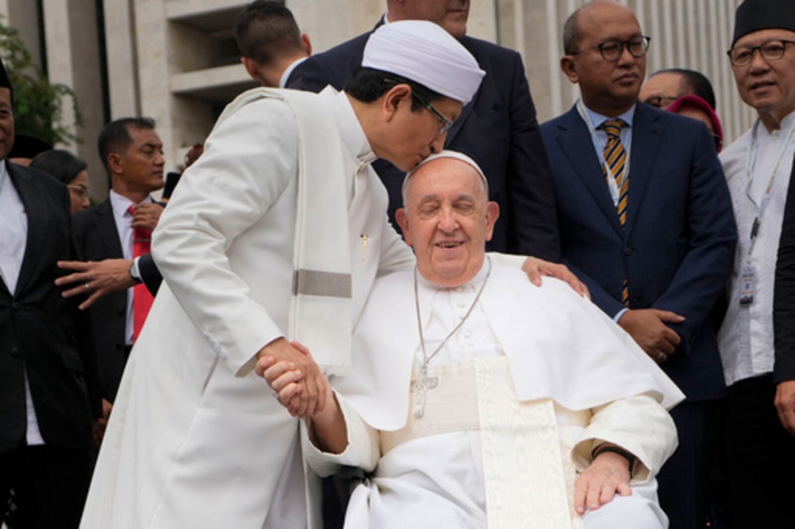 FILE - The Grand Imam Nasaruddin Umar, left, bids farewell to Pope Francis, as he leaves after signing the "Joint Declaration of Istiqlal 2024" at the Istiqlal Mosque in Jakarta, Thursday, Sept. 5, 2024. (AP Photo/Gregorio Borgia, File)