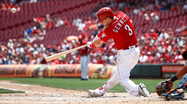 CINCINNATI, OH - JUNE 20: Scooter Gennett #3 of the Cincinnati Reds hits a two-run home run to tie the game in the sixth inning against the Detroit Tigers at Great American Ball Park on June 20, 2018 in Cincinnati, Ohio. The Reds won 5-3. (Photo by Joe Robbins/Getty Images)