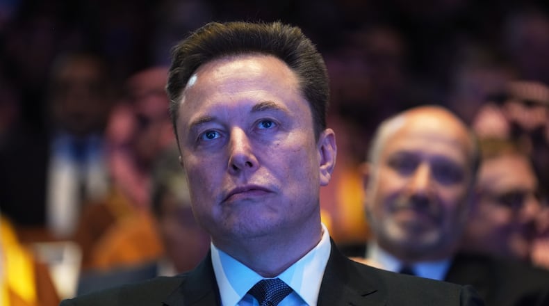 Elon Musk attends the Saudi Investment Forum at the Kennedy Center, Wednesday, Nov. 19, 2025, in Washington. (AP Photo/Evan Vucci)