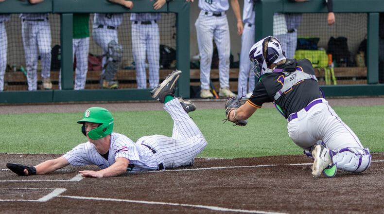 Badin's Cade Cummins scores on a single by Austin Vangen. Jeff Gilbert/CONTRIBUTED