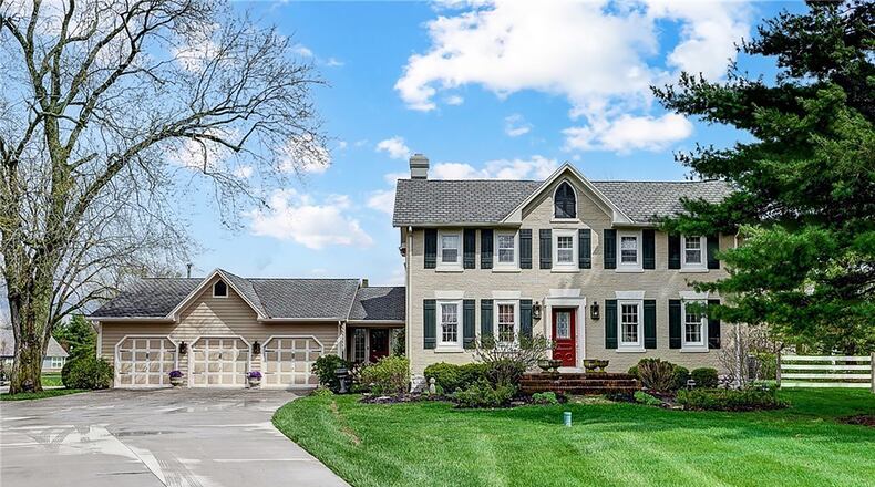 This 1800's era brick two story has many updates and sits on a large lot with professional landscaping