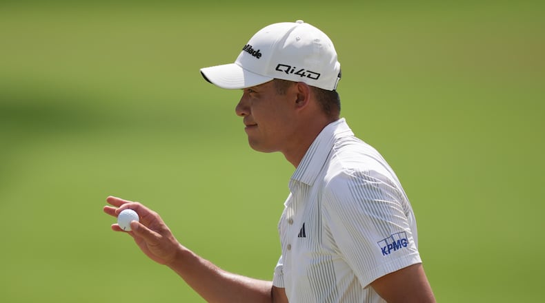 Collin Morikawa reacts after putting on the first hole during the final round of the Arnold Palmer Invitational at Bay Hill golf tournament Sunday, March 8, 2026, in Orlando, Fla. (AP Photo/Matt Slocum)