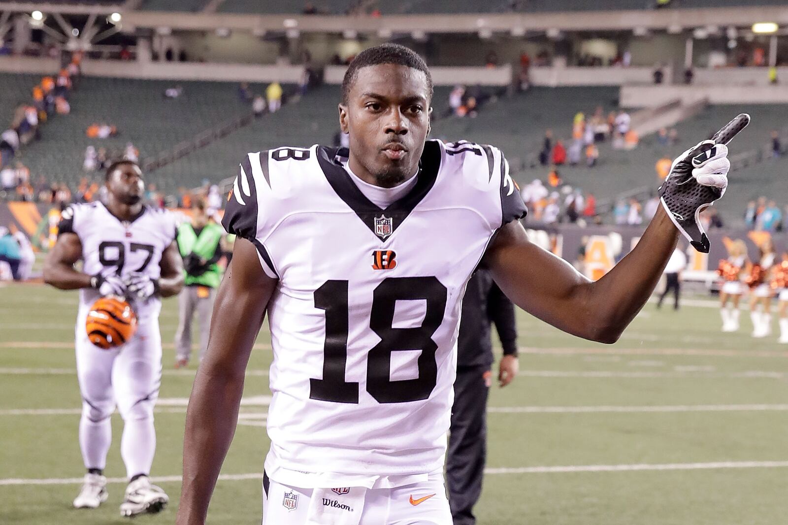 CINCINNATI, OH - SEPTEMBER 29: A.J. Green #18 of the Cincinnati Bengals celebrates while running off of the field after defeating the Miami Dolphins 22-7 at Paul Brown Stadium on September 29, 2016 in Cincinnati, Ohio. (Photo by Andy Lyons/Getty Images)