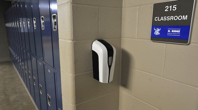 Miamisburg high school has installed 27 hand sanitizing stations throughout the building for the new school year. MARSHALL GORBY\STAFF