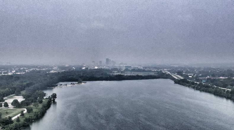 Smoke from forest fires in Canada has once again drifted over the Dayton area. This is a July 17, 2023 aerial photo of Eastwood Lake with the city of Dayton in the background. JIM NOELKER/STAFF