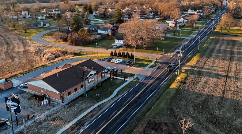 Bloom Dispensary on Main Street in Seven Mile offers medicinal and recreational use marijuana products. The dispensary potted the village about $401,000 from the state's host community fund, which redirects recreational sales tax proceeds back to communities that host marijuana dispensaries. NICK GRAHAM/STAFF