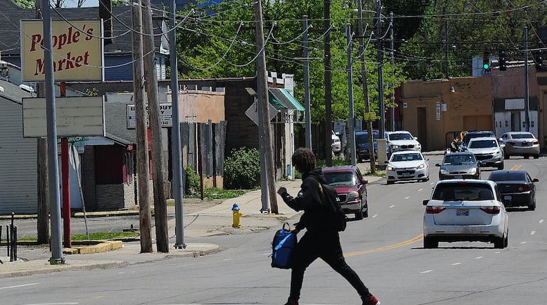 Dozens of pedestrian strikes have occurred on North Main Street in the last seven years. Dayton and state officials hope that millions of dollars in infrastructure upgrades will lead to fewer and less severe incidents. MARSHALL GORBY\STAFF