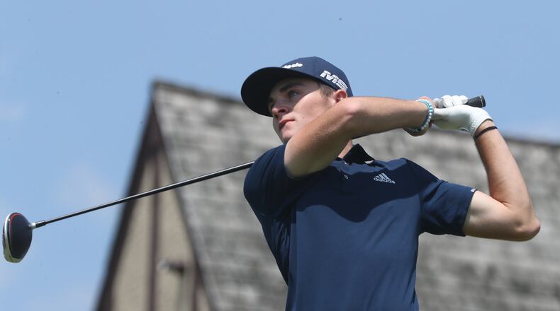 Butler High School graduate Austin Greaser tees off on the back nine of his second 18 holes at the US Open Championship Sectional Qualifier at the Springfield Country Club Monday. BILL LACKEY/STAFF